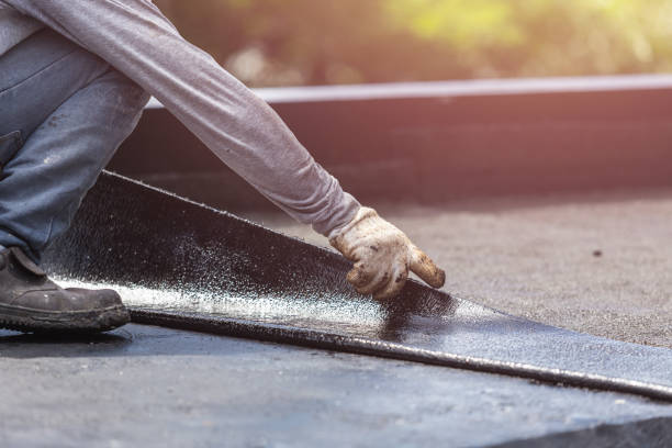 Professional Basement Waterproofing technician working in Vandalia, IL